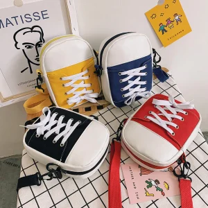 Sac messager polyvalent en toile cousue, à porter à l'épaule