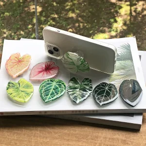 Support de téléphone en forme de feuille de plante tropicale