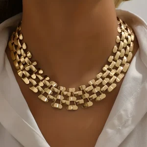 Collier audacieux à maillons hexagonaux creux dorés